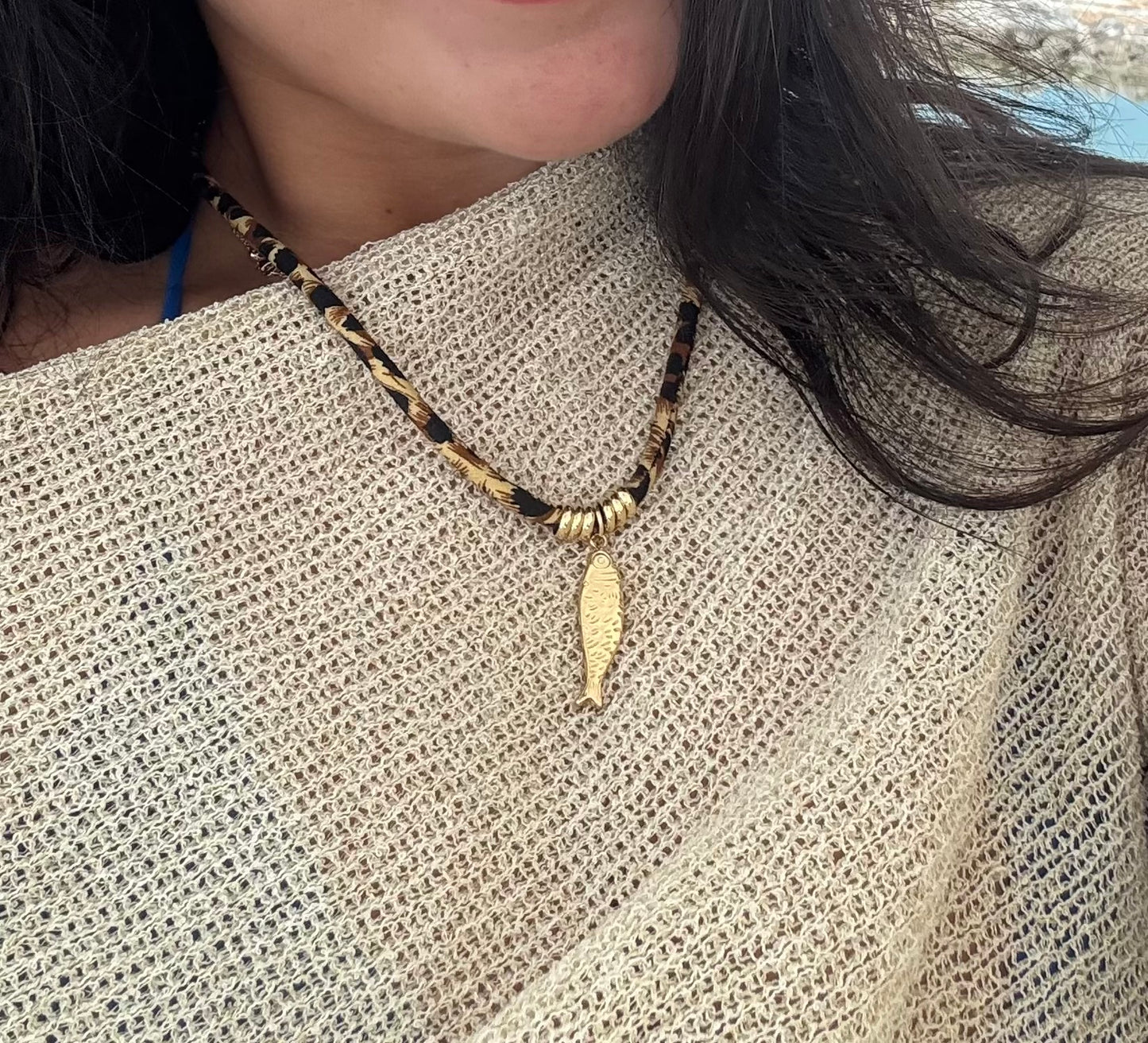 leo fish cord necklace