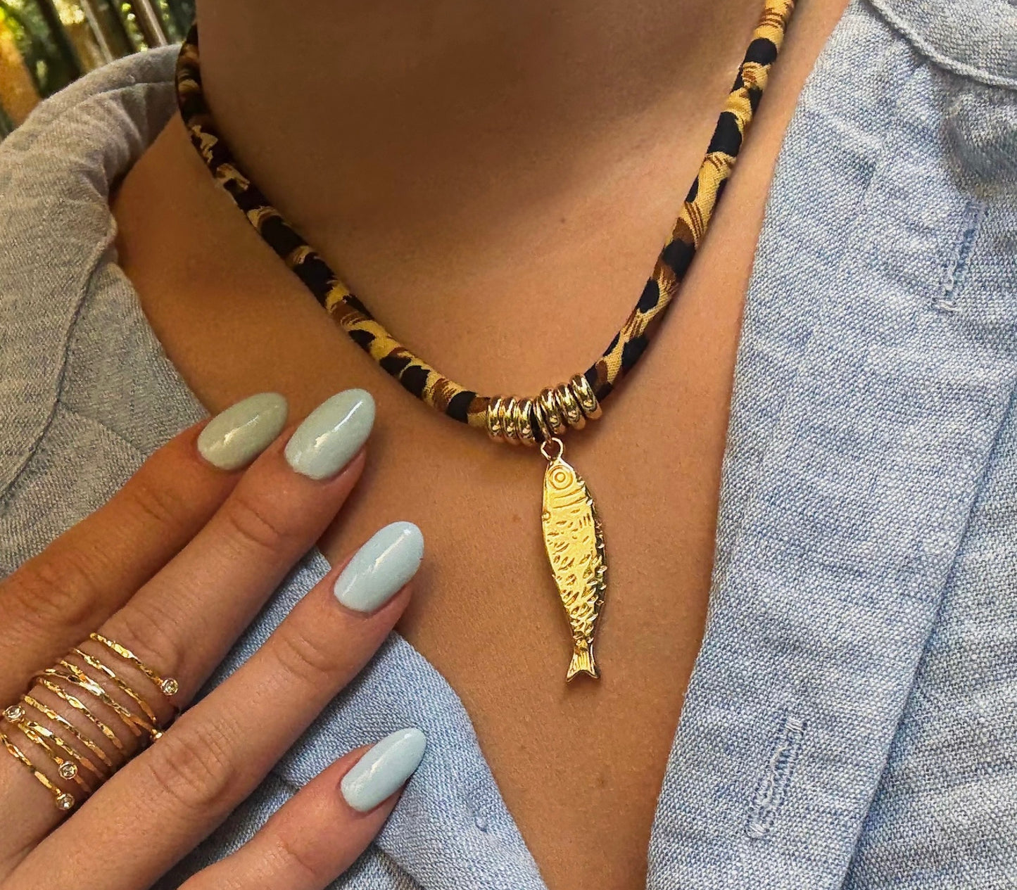 leo fish cord necklace